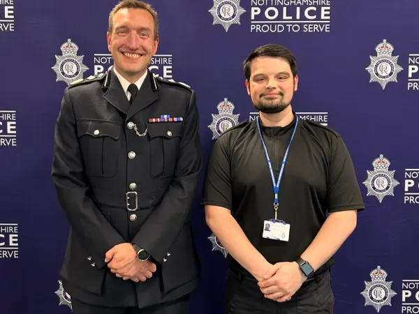 Sam, on the right, being sworn in as a police officer