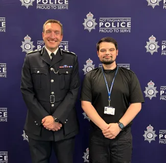 Sam, on the right, being sworn in as a police officer