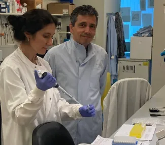 Two researchers are working in a lab